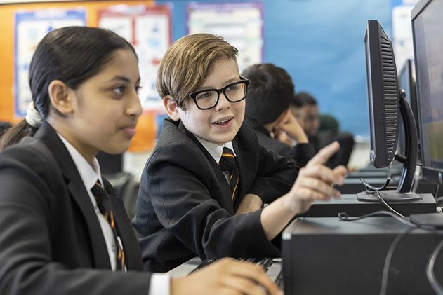 Students looking at computer screens